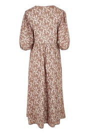 Product shot of the Summer Picnic Printed Cotton Smock Dress in colour Woodfleur, from the back
