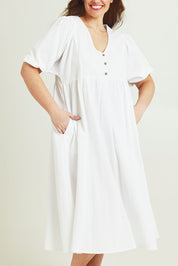 Model Jane wearing size 14 of the Summer Picnic Smock Dress in colour White (White), from the front, cropped image
