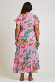 Model Ashleigh wearing size 16 of the Thats A Wrap Printed Cotton Dress in colour Pinkgarden (Pink), from the back