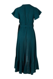 Product shot of the Thats A Wrap Organic Cotton Dress in colour Lagoon (Blue), from the back