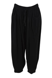 Product shot of the Beach Stroll Cotton Pants in colour Black (Black), from the front
