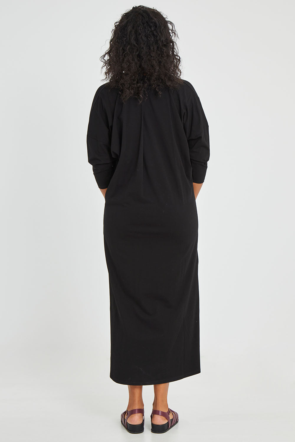 Model Noli wearing size 10 of the Elegantly Lounging Mercerised Cotton Maxi in colour Black (Black), from the back
