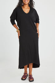 Model Noli wearing size 14 of the Elegantly Lounging Mercerised Cotton Maxi in colour Black (Black), from the front, cropped image