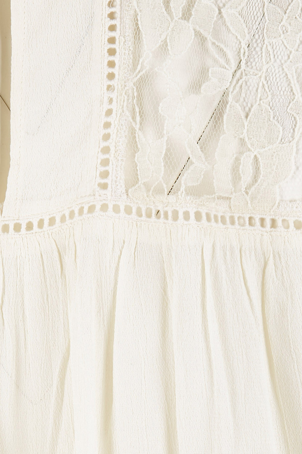 Product shot of the Im In Love Blouse in colour Buttermilk, detail