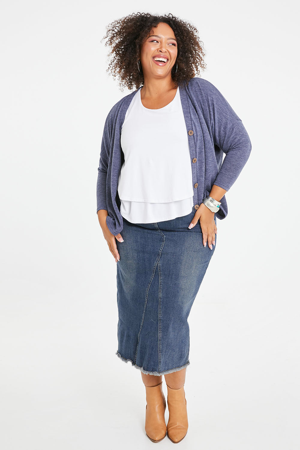 Model Alexis wearing size 16 of the Easy As Pull On Denim Skirt in colour Darkdenim (Blue), from the front, showing the whole outfit
