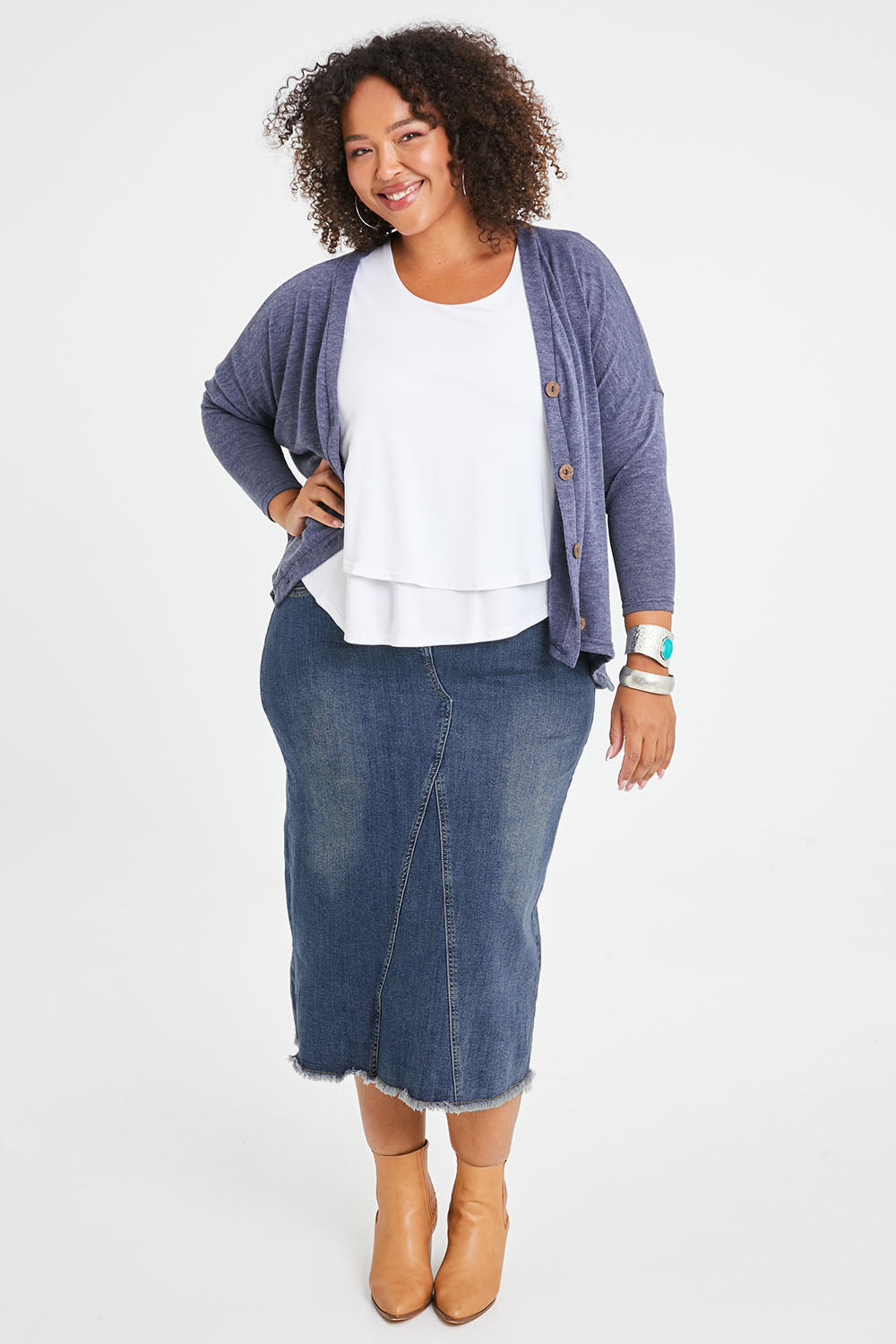 Model Alexis wearing size 16 of the Easy As Pull On Denim Skirt in colour Darkdenim (Blue), from the front, showing the whole outfit