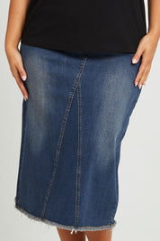Model Monique wearing size 14 of the Easy As Pull On Denim Skirt in colour Darkdenim (Blue), from the front, cropped image