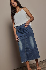 Model Tahnee wearing size 10 of the Easy As Pull On Denim Skirt in colour Darkdenim (Blue), from the front, showing the whole outfit