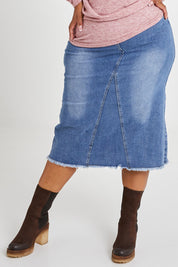 Model Alexis wearing size 16 of the Easy As Pull On Denim Skirt in colour Denim (Blue), from the front, cropped image