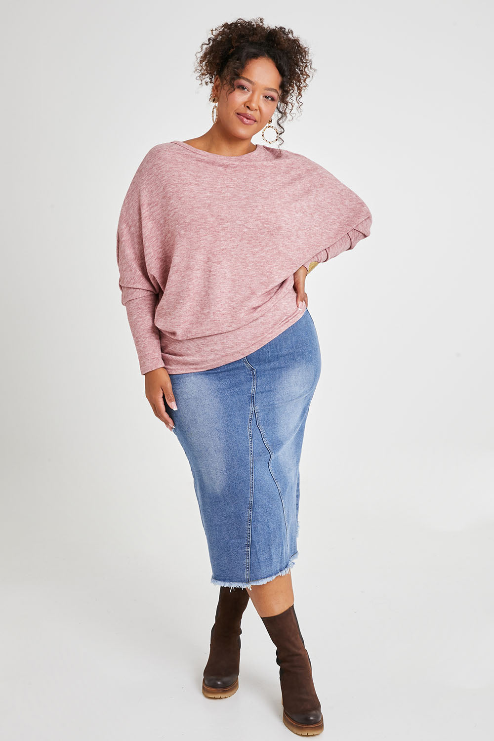 Model Alexis wearing size 16 of the Easy As Pull On Denim Skirt in colour Denim (Blue), from the front, showing the whole outfit