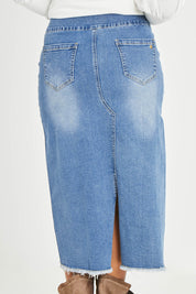 Model Noli wearing size 14 of the Easy As Pull On Denim Skirt in colour Denim (Blue), from the back