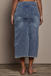 Model Tahnee wearing size 10 of the Easy As Pull On Denim Skirt in colour Denim (Blue), from the back