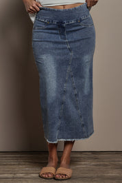Model Tahnee wearing size 10 of the Easy As Pull On Denim Skirt in colour Denim (Blue), from the front, cropped image
