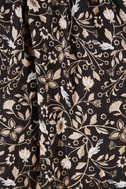 Product shot of the You Light Up The Room Dress in colour Blackbird (Black), detail