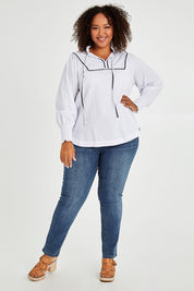 Model Alexis wearing size 16 of the Ric Rac Romance Blouse in colour White (White), from the front, showing the whole outfit