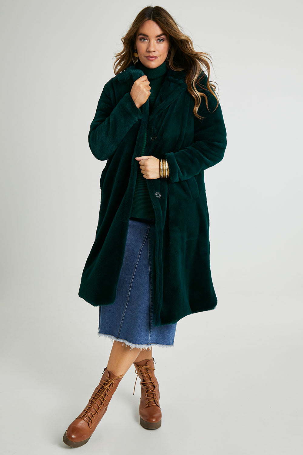 Model Laura wearing size 14 of the Adore You Faux Fur Coat in colour Lagoon (Green), from the front, showing the whole outfit