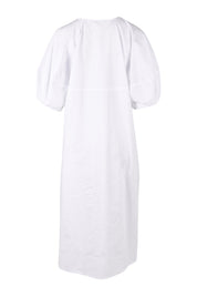 Product shot of the Light The Way Lantern Sleeve Dress in colour White (White), from the back