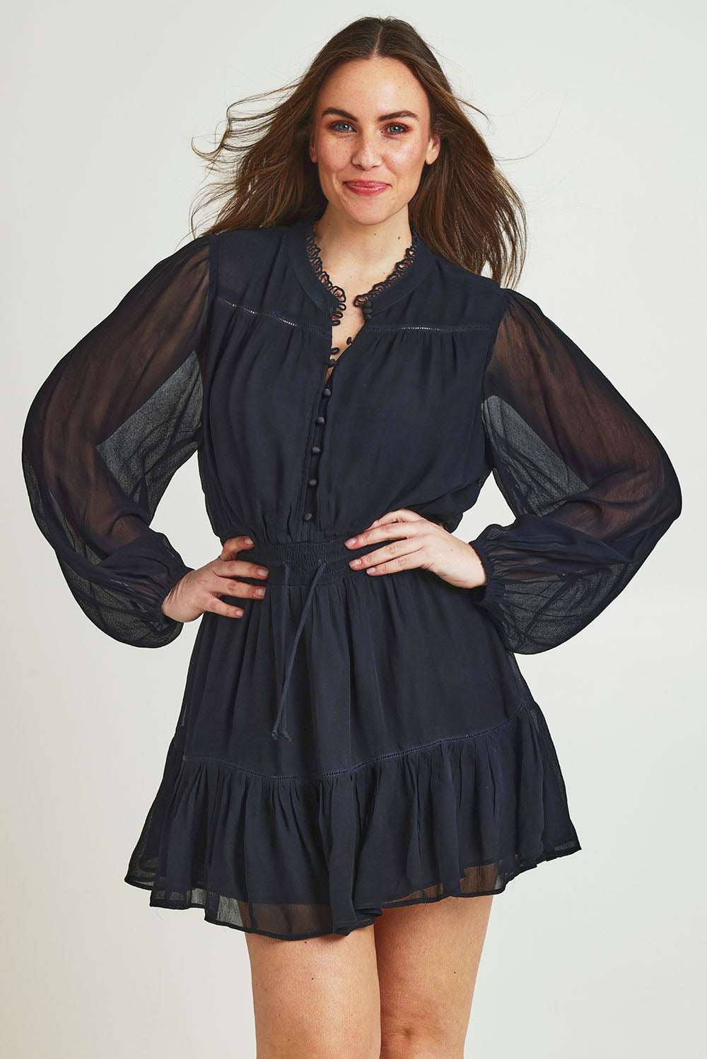 Model Jane wearing size 14 of the Take Me With You Dress in colour Black (Black), from the front, cropped image