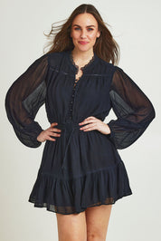 Model Jane wearing size 14 of the Take Me With You Dress in colour Black (Black), from the front, cropped image