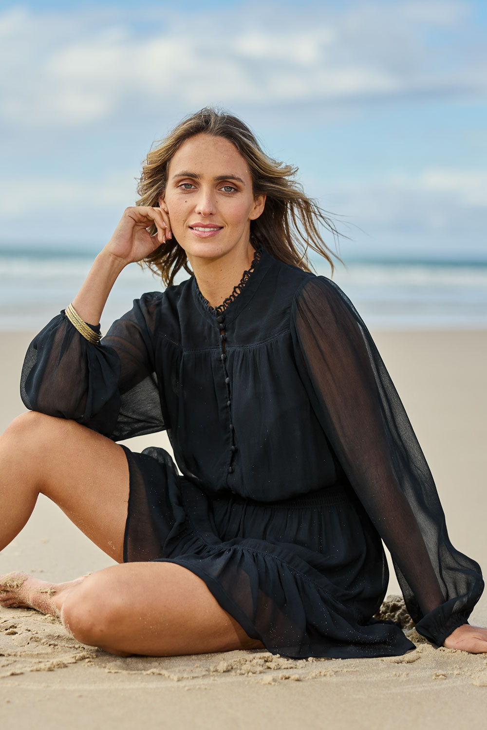 Model Tegan wearing size 10 of the Take Me With You Dress in colour Black (Black), from the front, showing the whole outfit