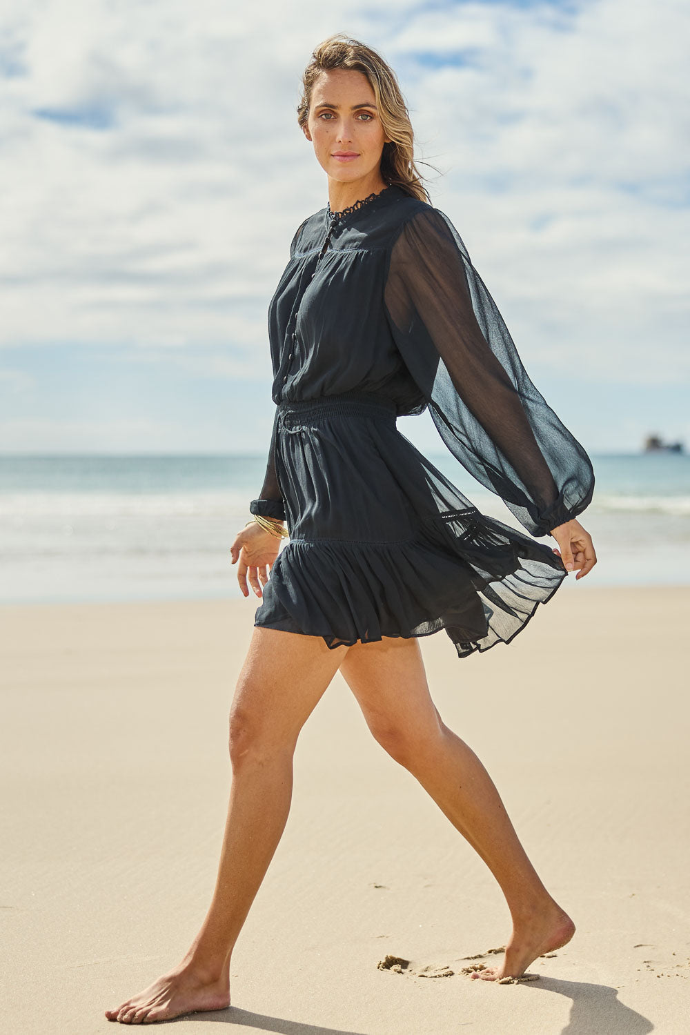 Model Tegan wearing size 10 of the Take Me With You Dress in colour Black (Black), from the front, showing the whole outfit