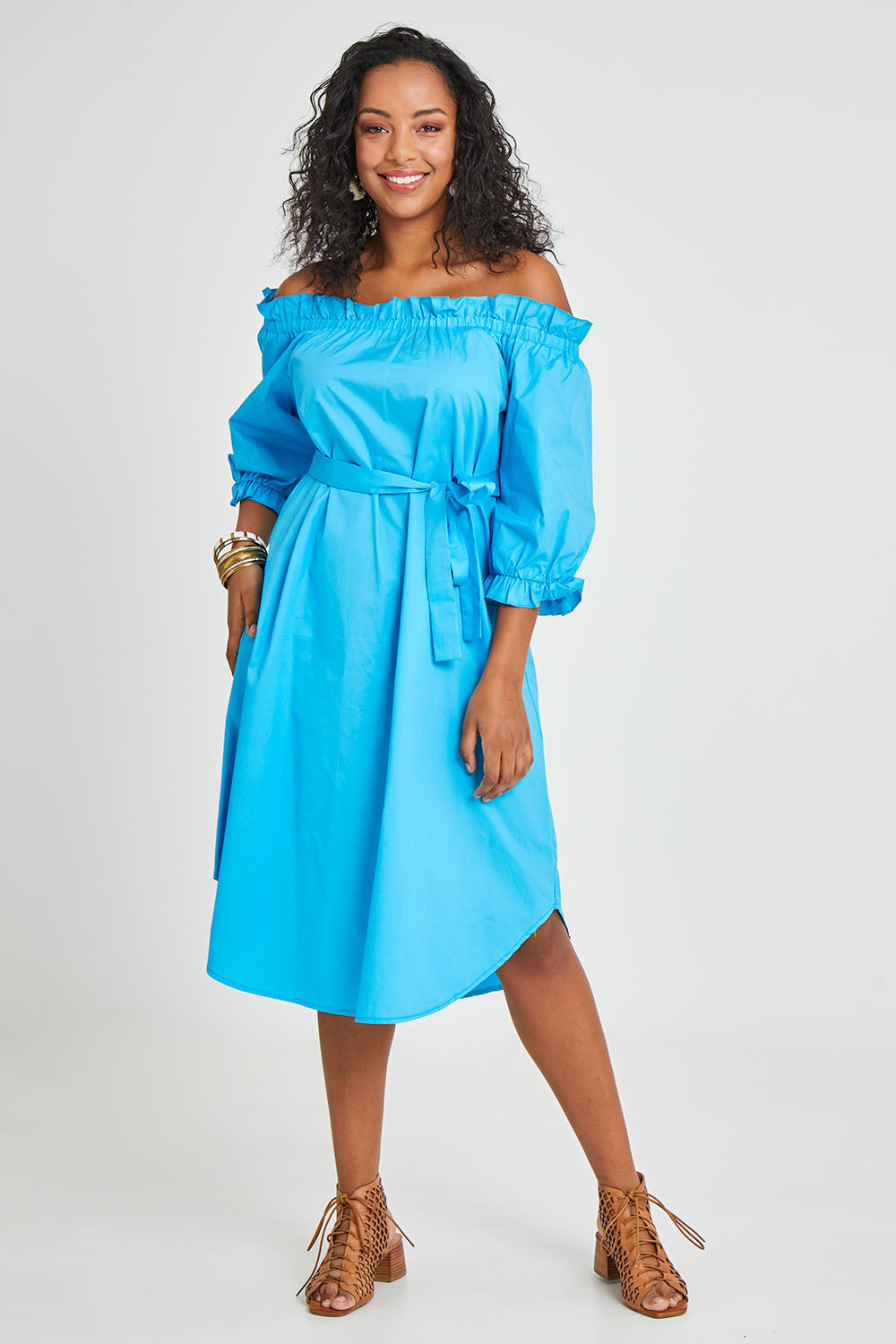 Model Noli wearing size 14 of the Good Vibes Off Shoulder Cotton Dress in colour Bluerad (Blue), from the front, showing the whole outfit