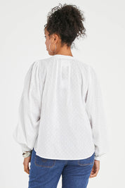 Model Noli wearing size 14 of the Lace And Flowers Cotton Blouse in colour Chalk (White), from the back