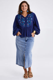 Model Monique wearing size 14 of the My Happiness Embroidered Blouse in colour Navycombo (Blue), from the front, showing the whole outfit