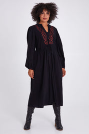 Model Olivia wearing size 10 of the For Love And Dancing Dress in colour Black (Black), from the front, showing the whole outfit