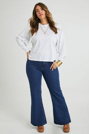 Model Laura wearing size 14 of the Ive Got This Top in colour White (White), from the front, showing the whole outfit