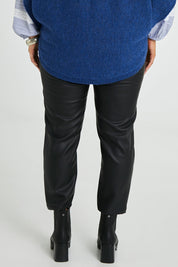Model Laura wearing size 14 of the Olivia Always Vegan Leather Pant in colour Black (Black), from the back