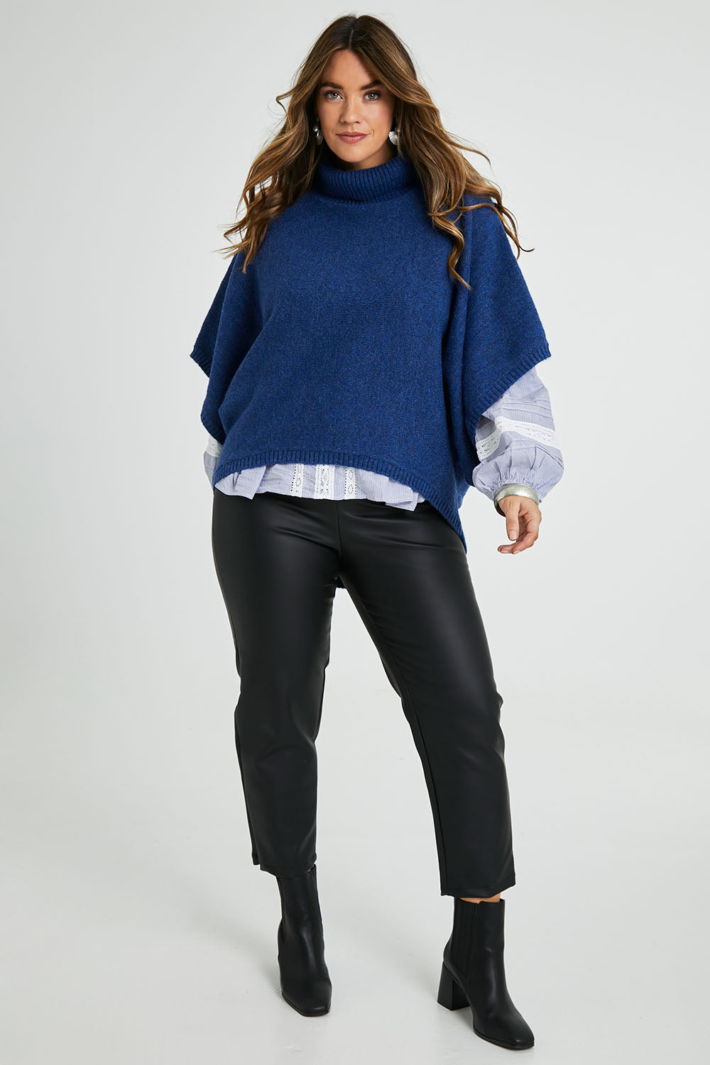 Model Laura wearing size 14 of the Olivia Always Vegan Leather Pant in colour Black (Black), from the front, showing the whole outfit