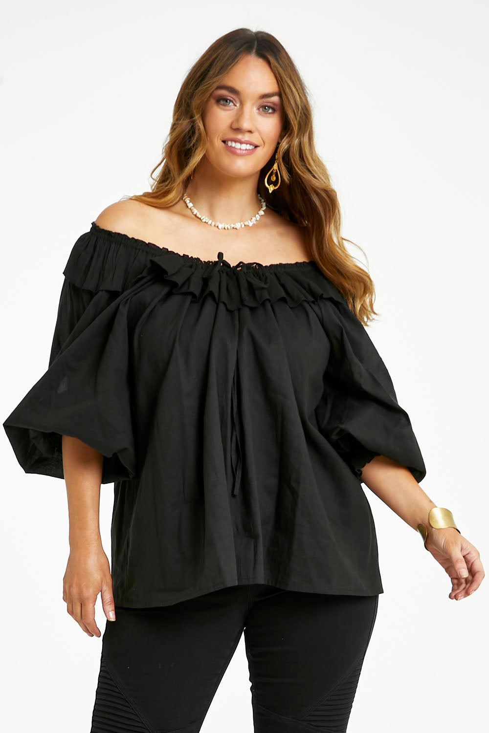 Model Laura wearing size 14 of the Date Night Cotton Ruffle Top in colour Black (Black), from the front, cropped image