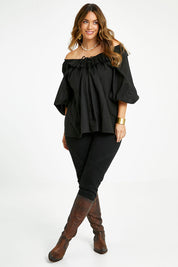 Model Laura wearing size 14 of the Date Night Cotton Ruffle Top in colour Black (Black), from the front, showing the whole outfit