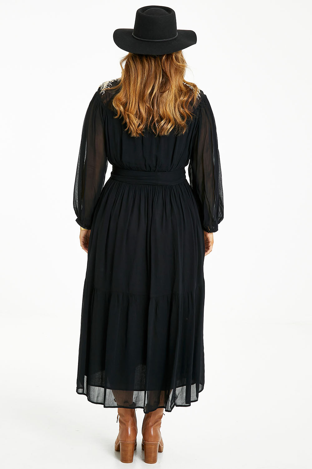 Model Laura wearing size 14 of the Good Vibes Embroidered Dress in colour Black (Black), from the back