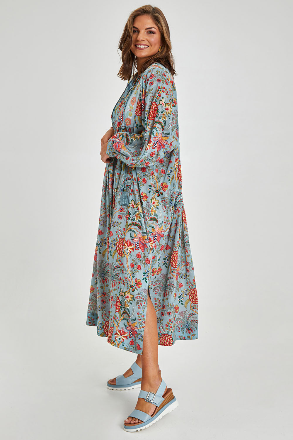 Model Monique wearing size 14 of the Now And Forever Dress in colour Icefleur (Blue), from the front, showing the whole outfit