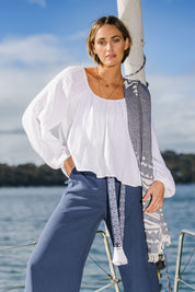 Model Tegan wearing size 10 of the Bringing Sexy Back Blouse in colour White (White), from the front, showing the whole outfit