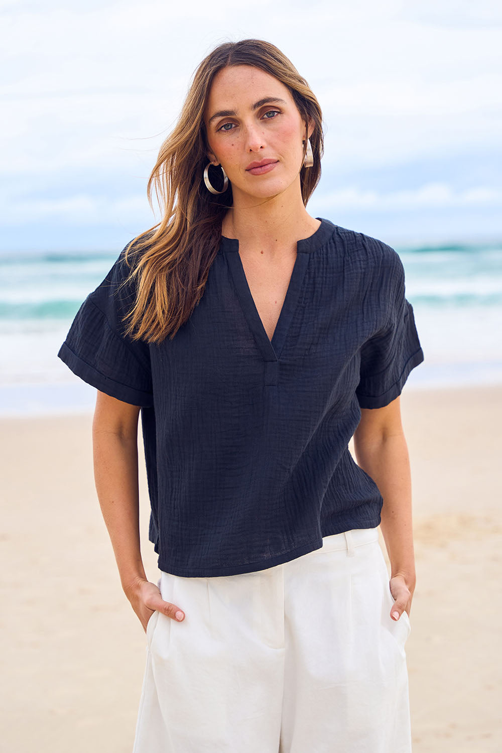 Model Tegan wearing size 10 of the Every Other Day Cotton Blouse in colour Black (Black), from the front, showing the whole outfit