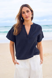 Model Tegan wearing size 10 of the Every Other Day Cotton Blouse in colour Black (Black), from the front, showing the whole outfit