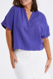 Model Monique wearing size 14 of the Every Other Day Cotton Blouse in colour Blue (Blue), from the front, cropped image