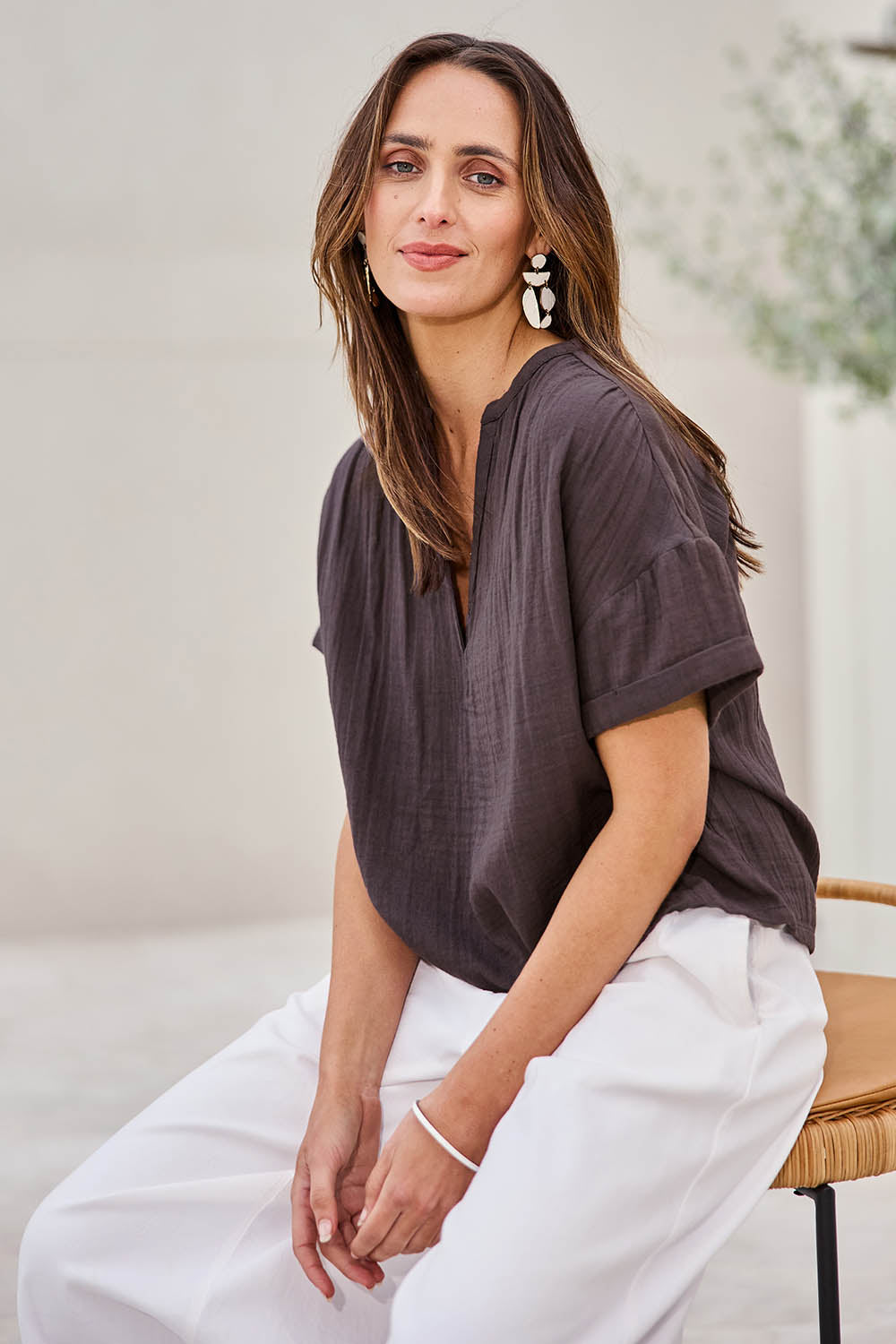 Model Tegand wearing size 10 of the Every Other Day Cotton Blouse – Chocolate in colour Chocolate, in a cropped view