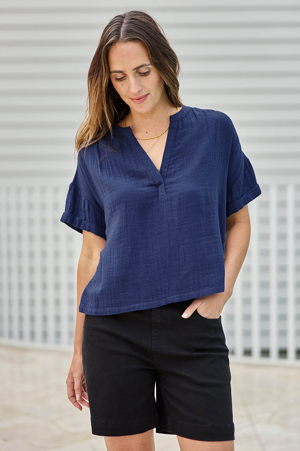 Model Tegand wearing size 10 of the Every Other Day Cotton Blouse – Deepblue in colour Deepblue, in a cropped view