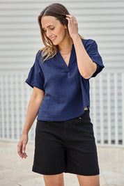 Model Tegand wearing size 10 of the Every Other Day Cotton Blouse – Deepblue in colour Deepblue, in a cropped view