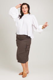 Model Poppy wearing size 16 of the My Fair Lady Blouse in colour White (White), from the front, showing the whole outfit