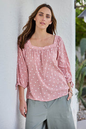 Model Tegand wearing size 10 of the Picking Flowers Blouse – Pinkhue in colour Pinkhue, in a cropped view