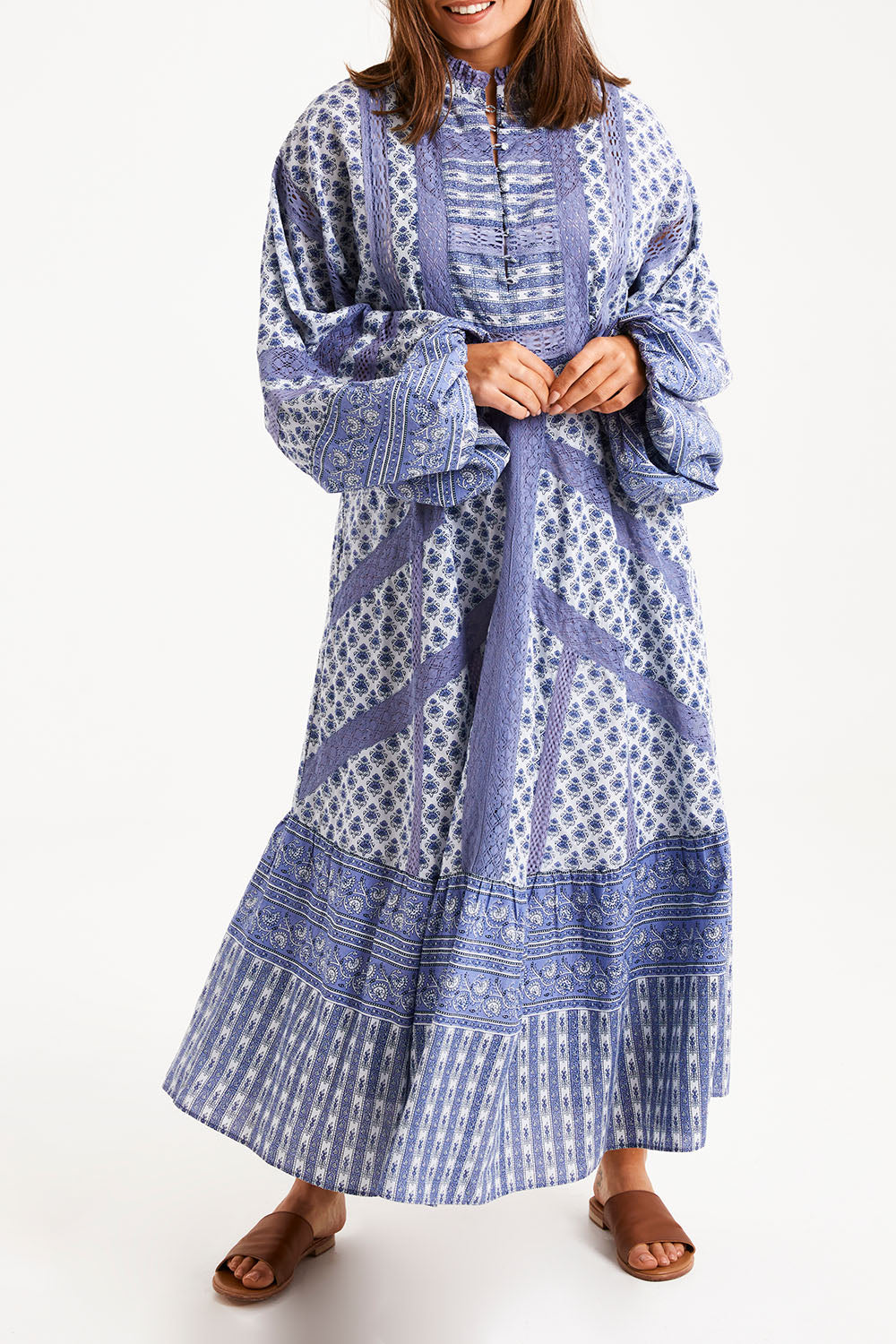 Model Monique wearing size 14 of the Under A Blue Sky Maxi Dress in colour Bluefleur (Blue), from the front, cropped image