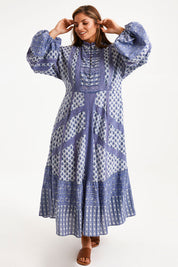 Model Monique wearing size 14 of the Under A Blue Sky Maxi Dress in colour Bluefleur (Blue), from the front, showing the whole outfit