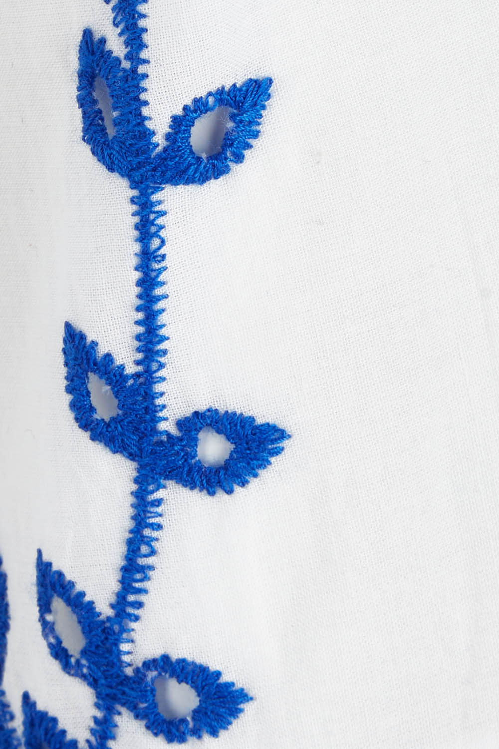 Product shot of the Feel My Vibe Embroidered Blouse in colour Whiteblue (White), detail