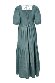 Product shot of the Chasing Butterflies Cotton Dress in colour Sage (Green), from the back