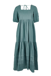 Product shot of the Chasing Butterflies Cotton Dress in colour Sage (Green), from the front